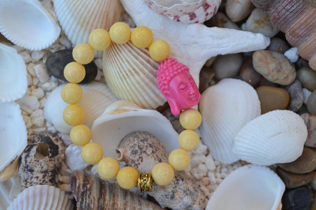 Yellow Sponge Coral Bracelet With Nice Pink Howlite Budha Bead.